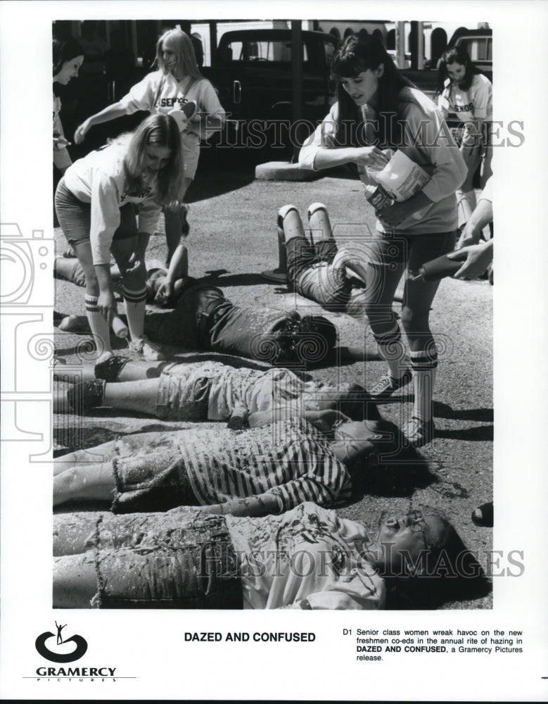 1994, Senior class women haze freshman in Dazed and Confused. - Historic Images