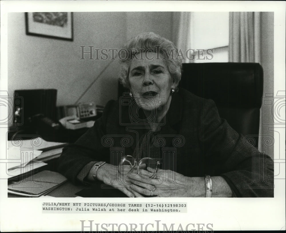 1983 Julia Walsh at her desk in Washington. - Historic Images