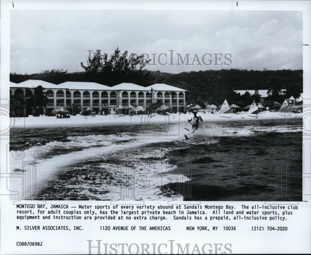 1992, A vacation participates in water sports at Sandals Montego Bay. - Historic Images