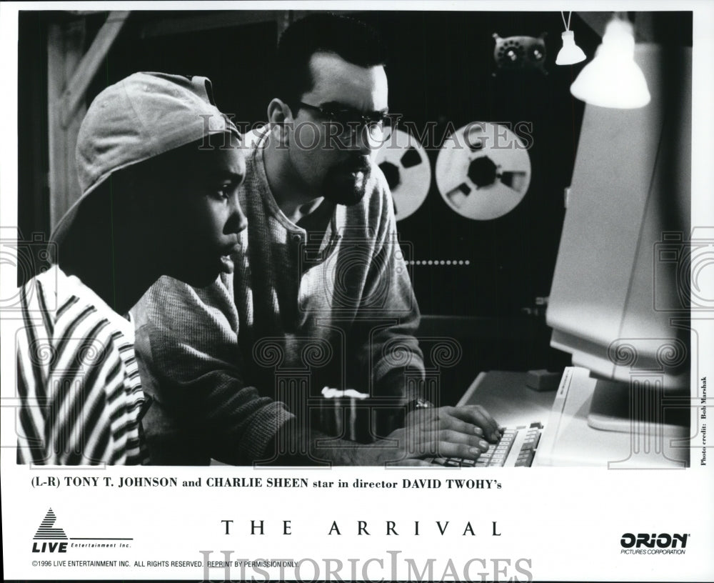 Press Photo Tony T Johnson and Charlie Sheen in The Arrival - cvp93573 - Historic Images