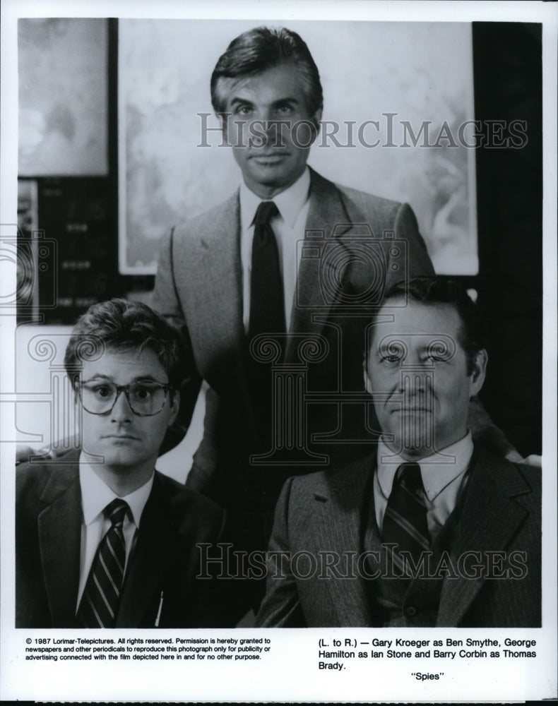1987, Gary Kroeger,George Hamilton and Barry Corbin in &quot;Spies&quot; - Historic Images