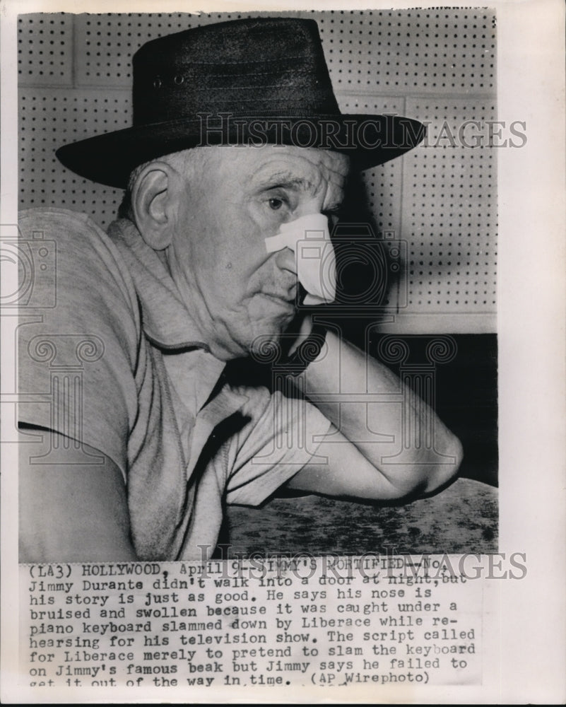 1954 Press Photo Jimmy Durante with a bruised beak. - Historic Images