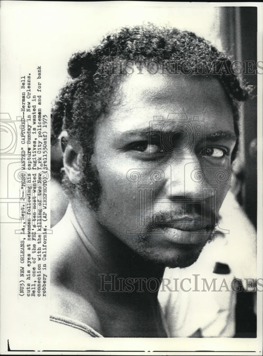 1973 Wire Photo Herman Bell cuts his eyes at newsmen in New Orleans  - Historic Images