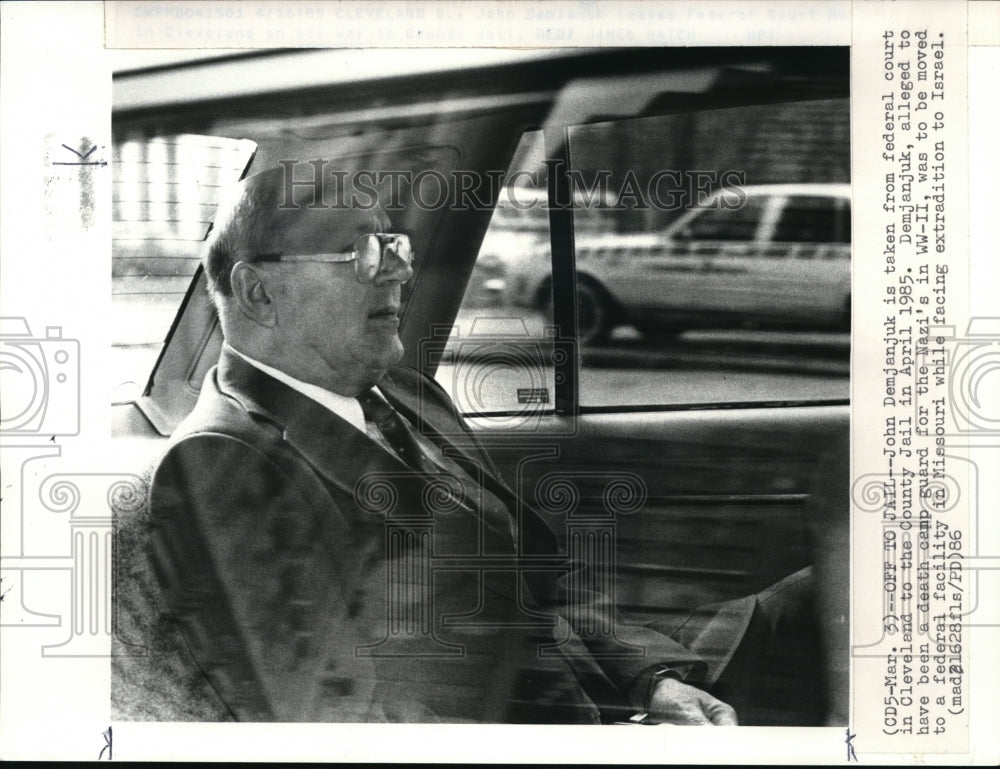 1985 John Demjanjuk leaves court house in Marshal&#39;s car - Historic Images