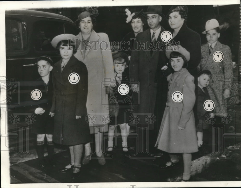 Undated Press Photo Mr. and Mrs.Oliva Dionne with their Quintuplets at Toronto. - Historic Images