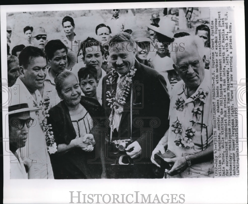 1955 U.S Supreme Court Justice William O. Douglas shakes hands with - Historic Images