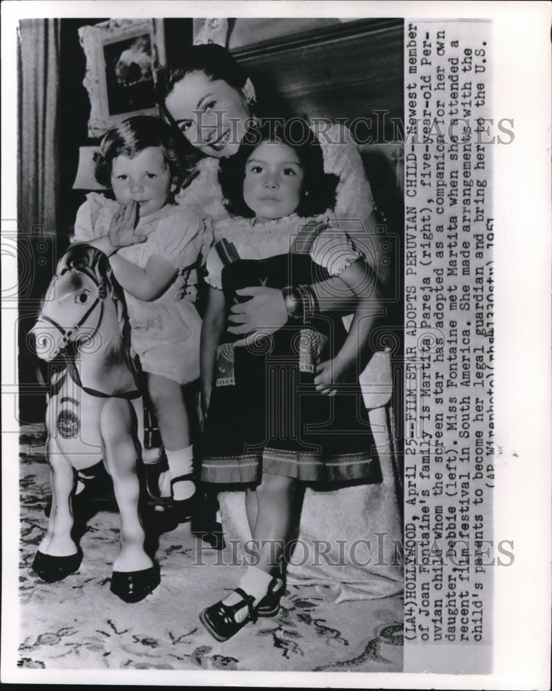 1951 Press Photo FIlm star, Joan Fontaine, adopts Peruvian child-Historic Images