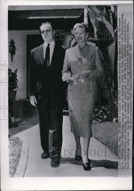 1952 Wire Photo The couple is smiling brightly to the reporters but not talking - Historic Images