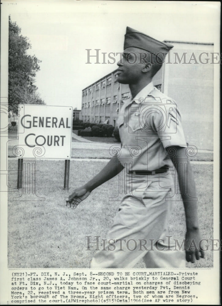 1966 Private First class James A. Johnson Jr. walks briskly - Historic Images