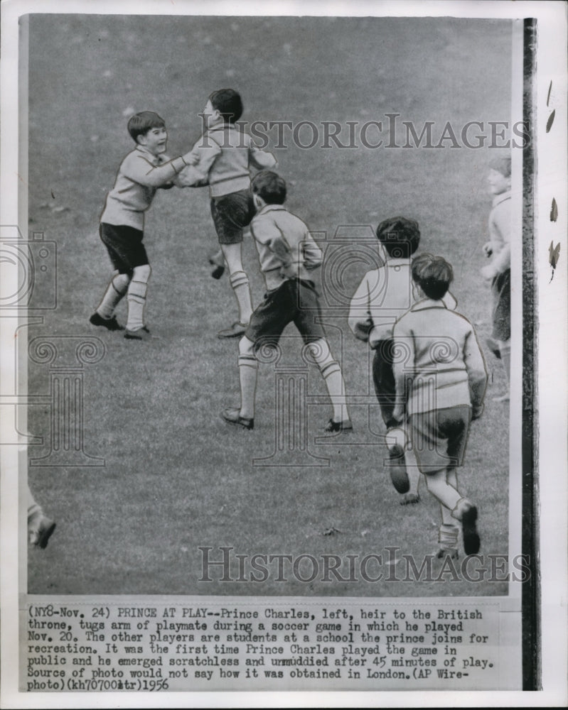 1956 Press Photo Prince Charles playing soccer at a school in London-Historic Images