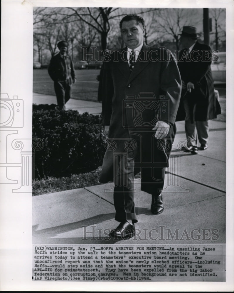 1958 Press Photo Unsmiling James Hoffa arrives for meeting in Washington - Historic Images