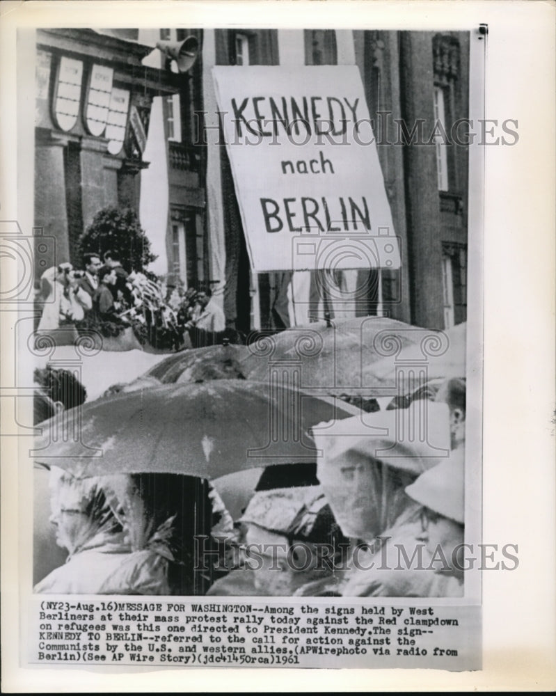 1961 Among the signs held by West Berliners at their mass protest - Historic Images