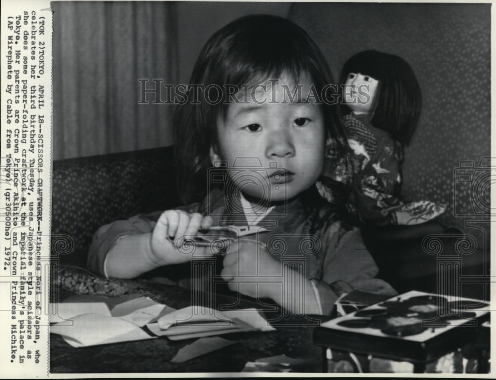 1972 Press Photo Princess Nori on paper-folding artwork at her third birthday - Historic Images