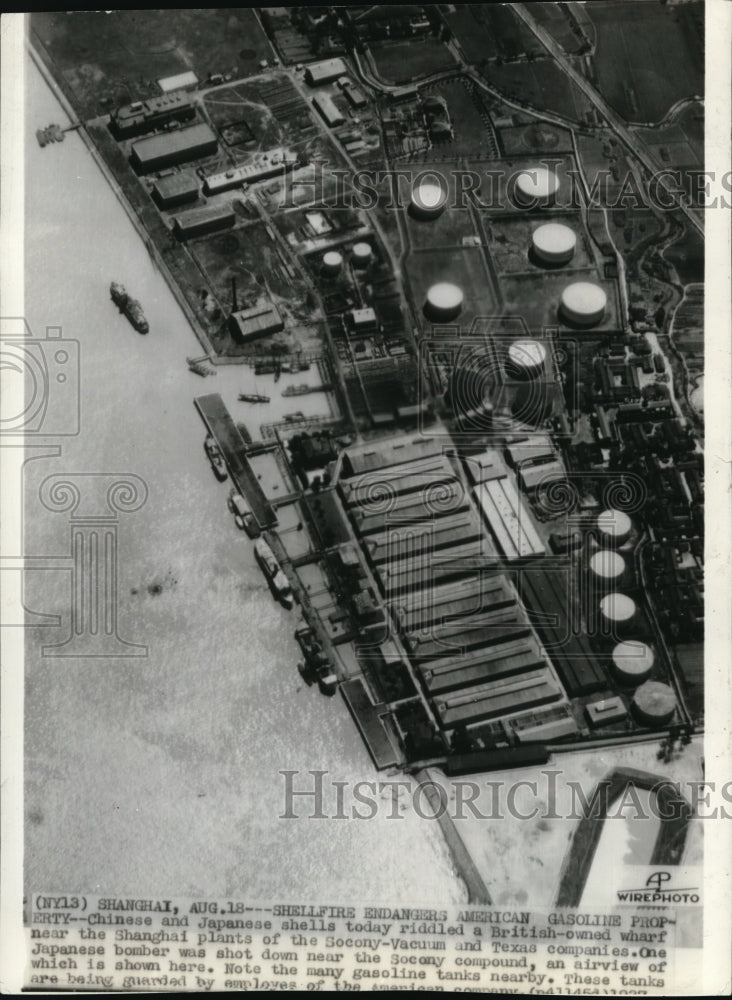 Press Photo Japanese and Chinese shells riddled a British owned wharf- Historic Images