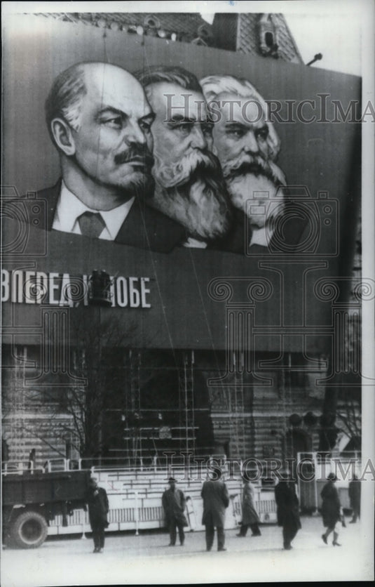 1966 Huge sign bearing portraits of the three heroes of Communism - Historic Images