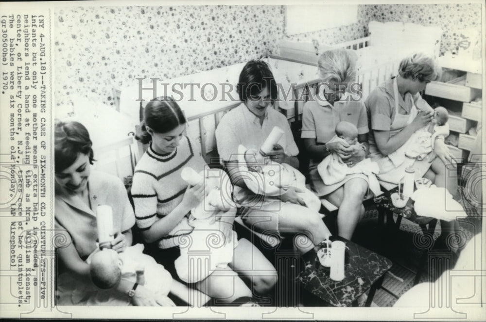 1970 Press Photo Taking care of Six-month old quintuplets - Historic Images