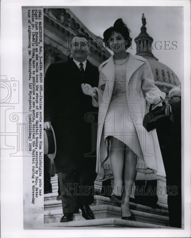 1958 Press Photo Actress Gina Lollobrigida escorted by Rep. Peter Rodino Jr - Historic Images