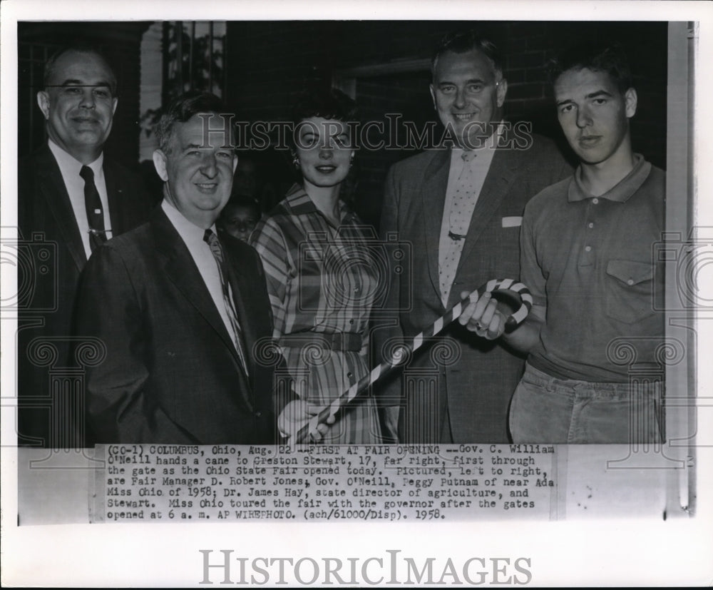 1958 Press Photo Gov C. William O&#39;Neill hands a cane to Creston Stewart - Historic Images