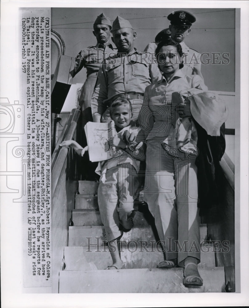 1957 Wire Photo Sgt. Robert Reynolds of Colora is preceededdown the ramp by his - Historic Images