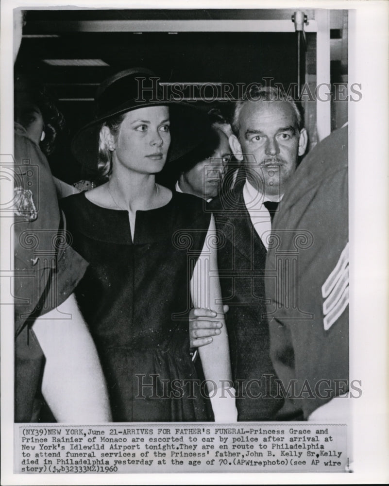 1960 Press Photo Princess Grace and Prince Rainier of Monaco are escorted to car - Historic Images