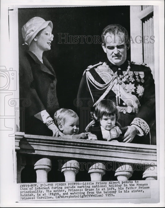 1959 Little Prince Albert points to item of interest during parade - Historic Images