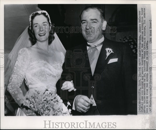 1953 Senator Joseph McCarthy with his bride at the wedding reception - Historic Images