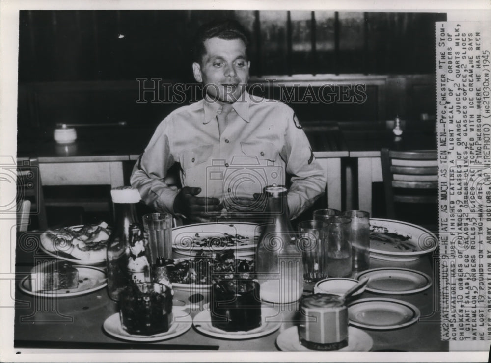 1945 Press Photo Pfc. Chester The Stomach Salvatori finished ten men meals. - Historic Images