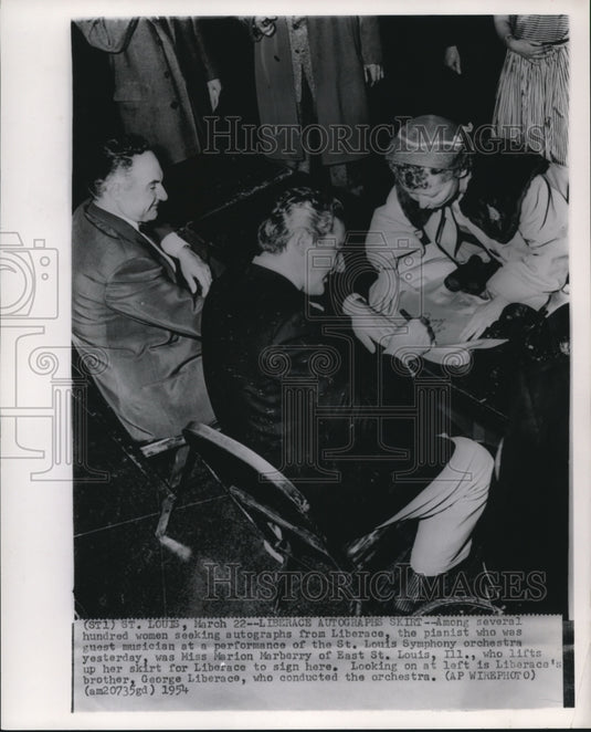 1954 Press Photo Pianist Marion Marberry had her skirt for a Liberance signature- Historic Images