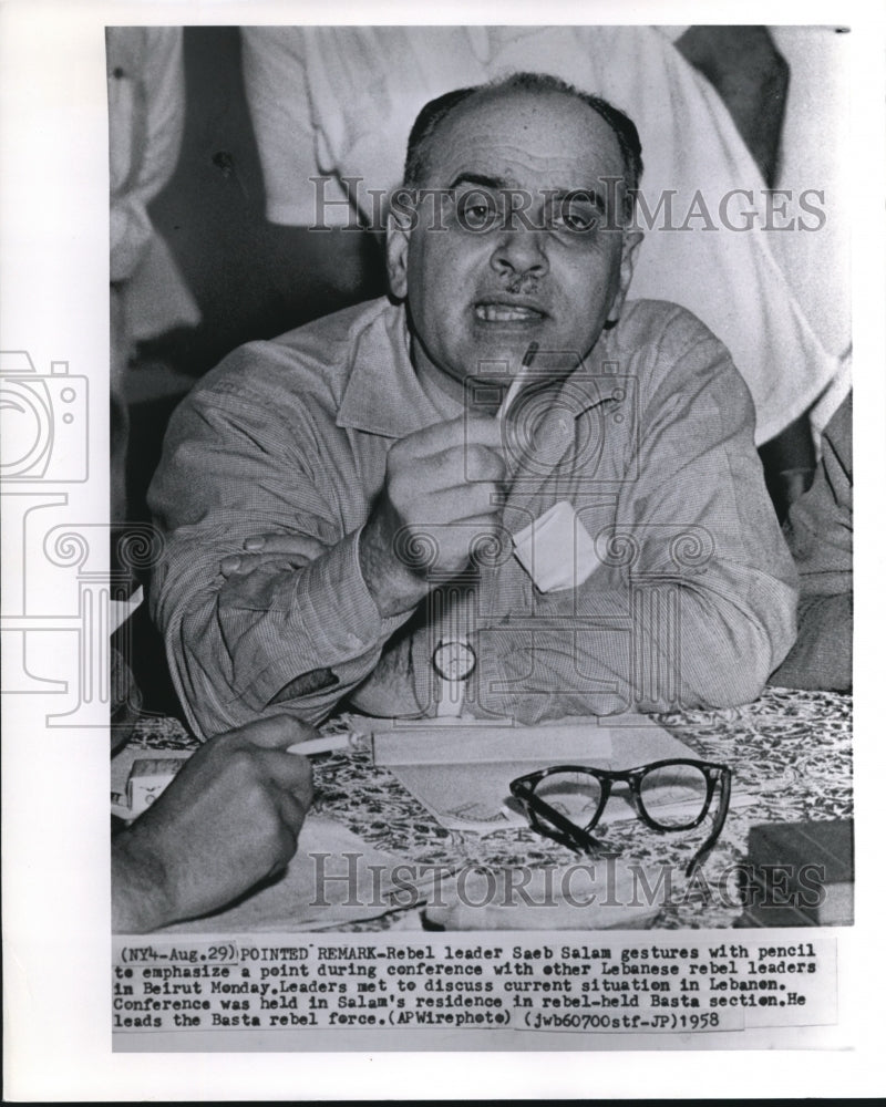 1958 Rebel leader Saeb Salem  during a conference - Historic Images