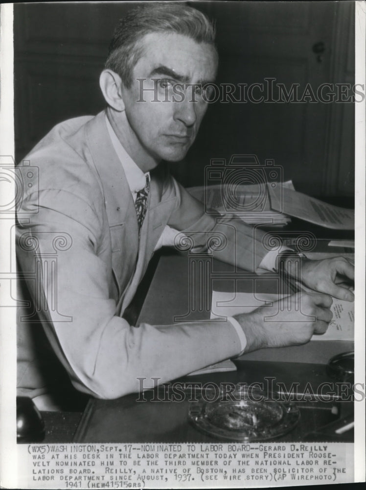 1941 Press Photo Gerald D. Reilly at His Desk in the Labor Department - Historic Images