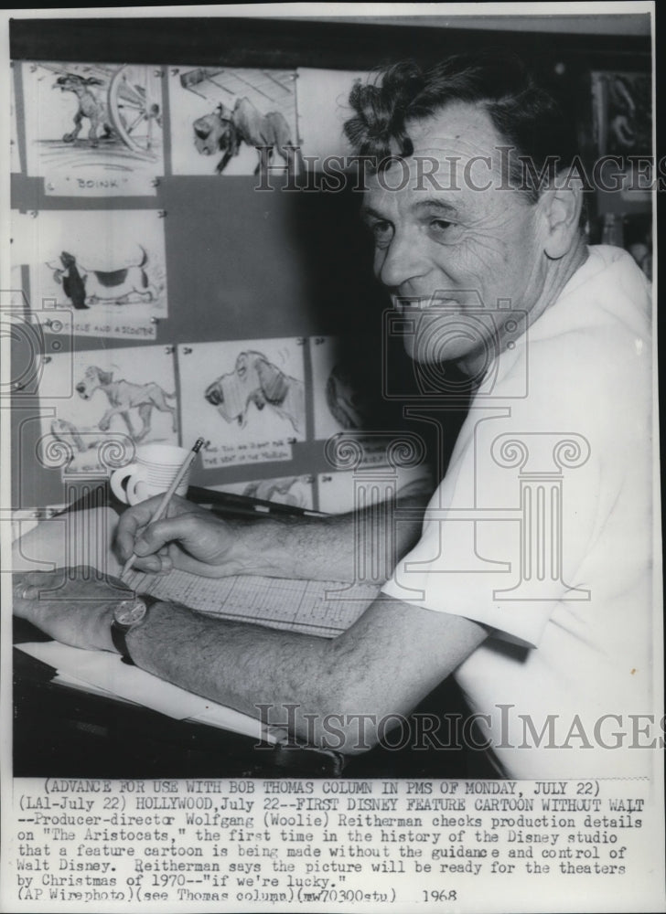 1968 Press Photo Wolfgang Reithermann Checks Production Details - Historic Images