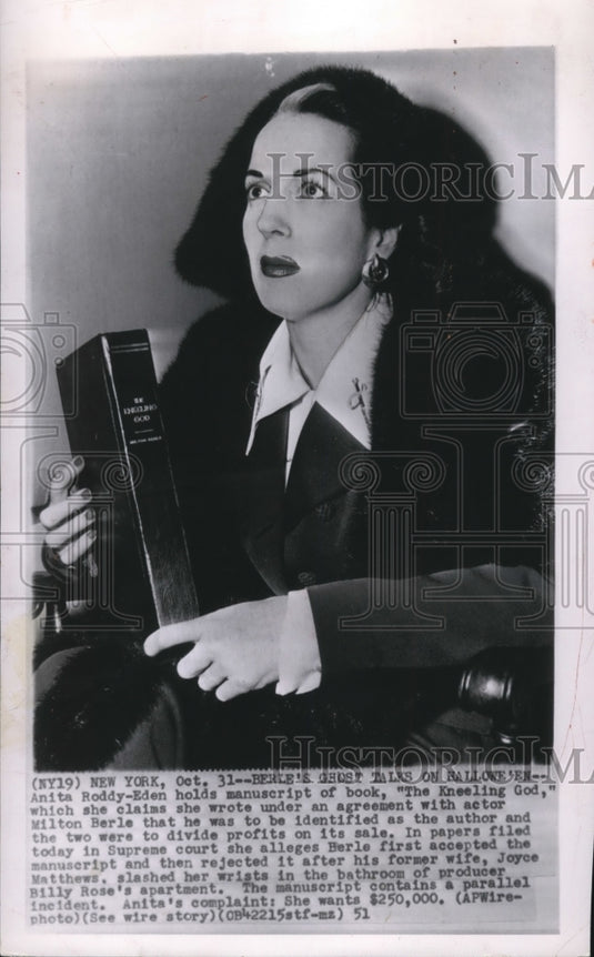 1951 Press Photo Anita Roddy-Eden holds manuscript of book, "The Kneeling God," - Historic Images