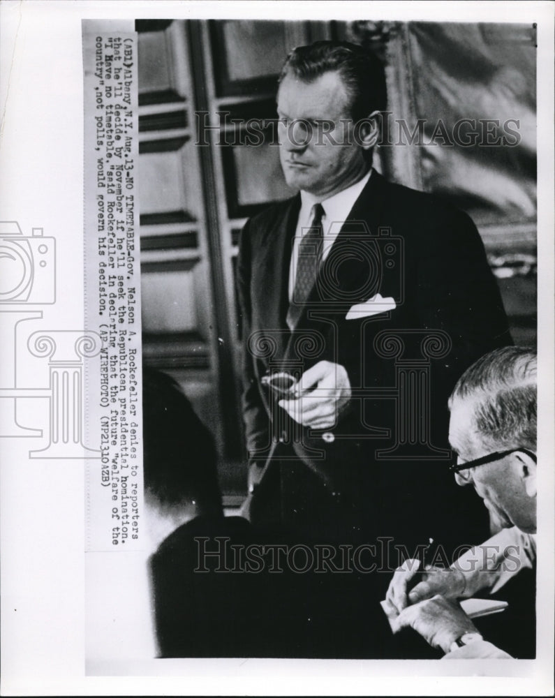 1959 Press Photo Nelson A. Rockefeller denies to reporters that he&#39;ll decide by - Historic Images