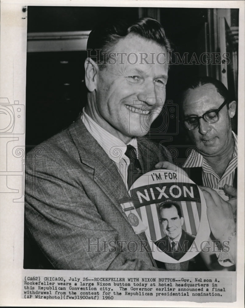 1960 Press Photo Gov. Nelson A. Rockefeller wears a large Nixon button today at - Historic Images