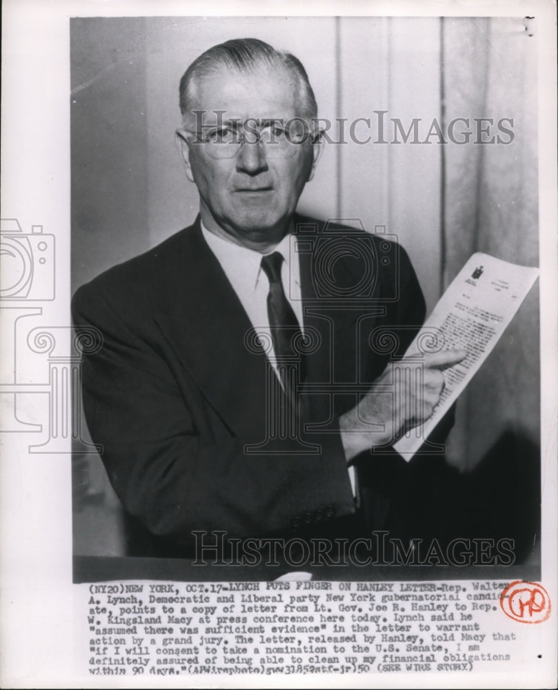 1950 Press Photo Rep. Walton A. Lynch, points to a copy of letter from Lt. Gov. - Historic Images