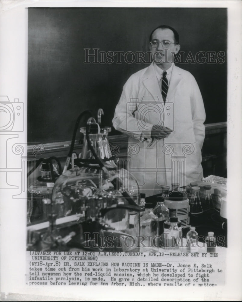 1955 Dr. Jonas E. Salk takes time out from his work in laboratory - Historic Images