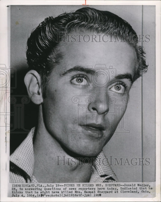 1957 Donald Wedler in answering questions of news reporters - Historic Images