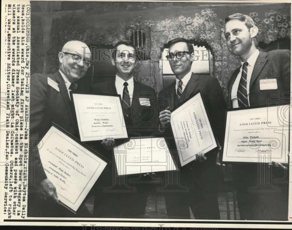 1969 John Nichols holds his award for taking first place - Historic Images