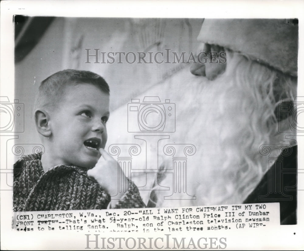 1961 Press Photo Ralph Clinton happy to see Santa Claus - Historic Images