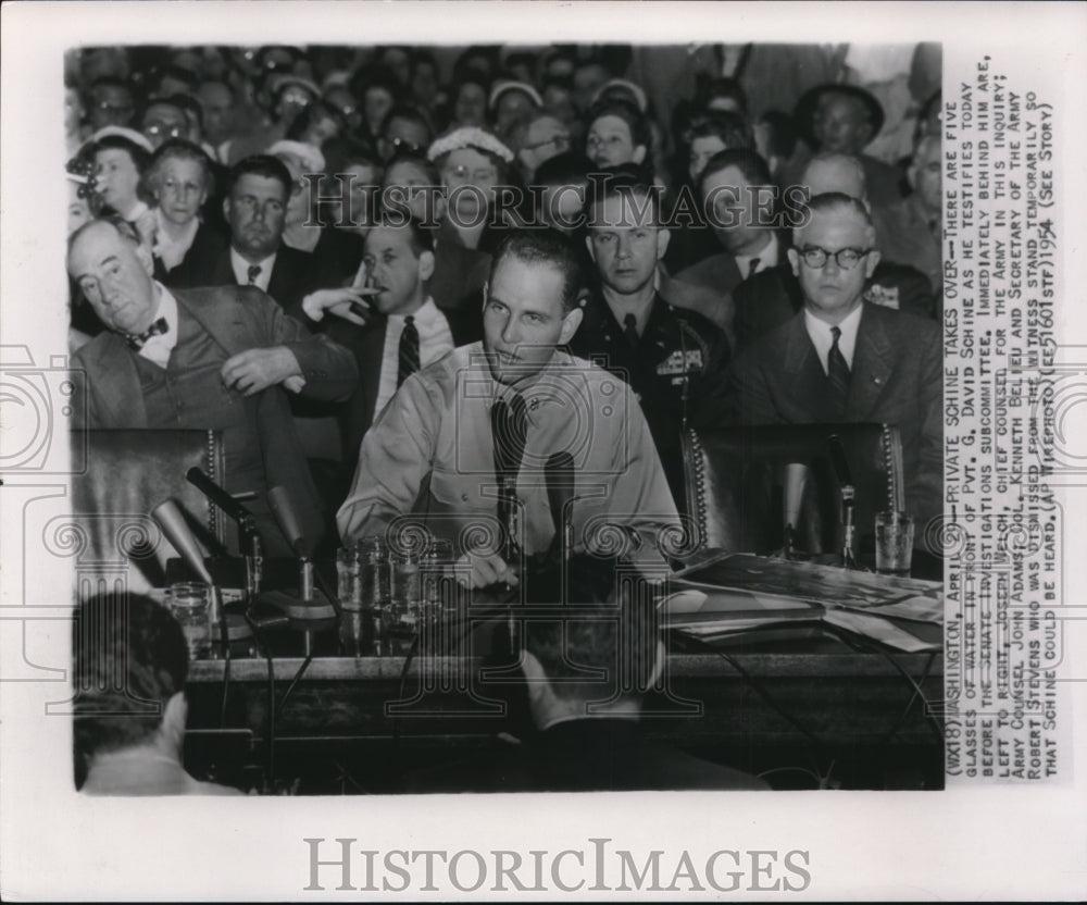 1954 Press Photo There are five glasses of water in front of Pvt. G. David - Historic Images