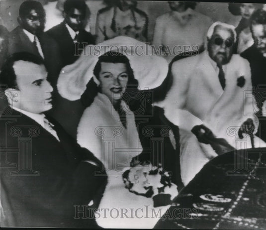 1949 Press Photo Hayworth and Prince Khan in France during wedding ceremony - Historic Images