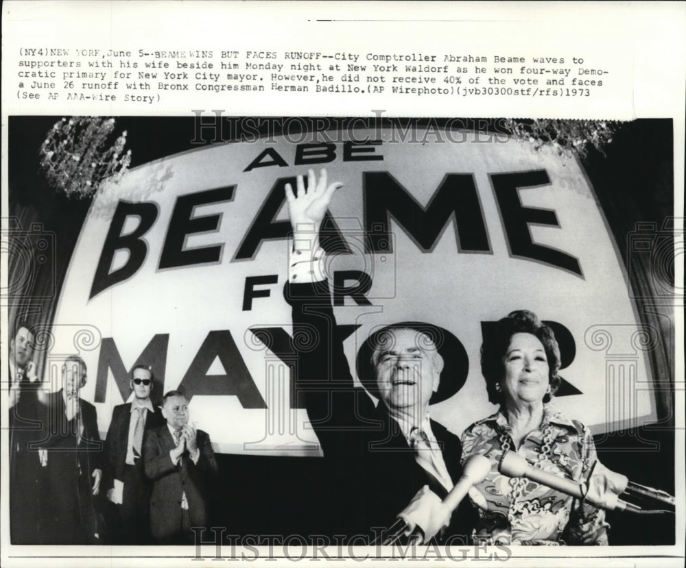 1973 Press Photo Abraham Beame waves to supporters with his wife beside him - Historic Images