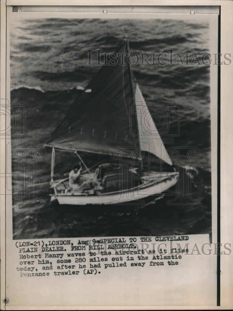 Wire Photo Robert Manry sails with his boat, Tinkerbelle across the Atlantic - Historic Images