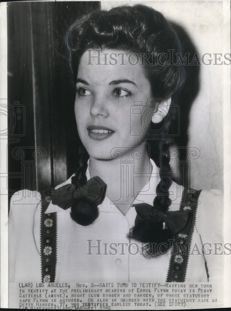 1942 Press Photo Peggy Satterle testify at Flynn&#39;s preliminary hearing - Historic Images