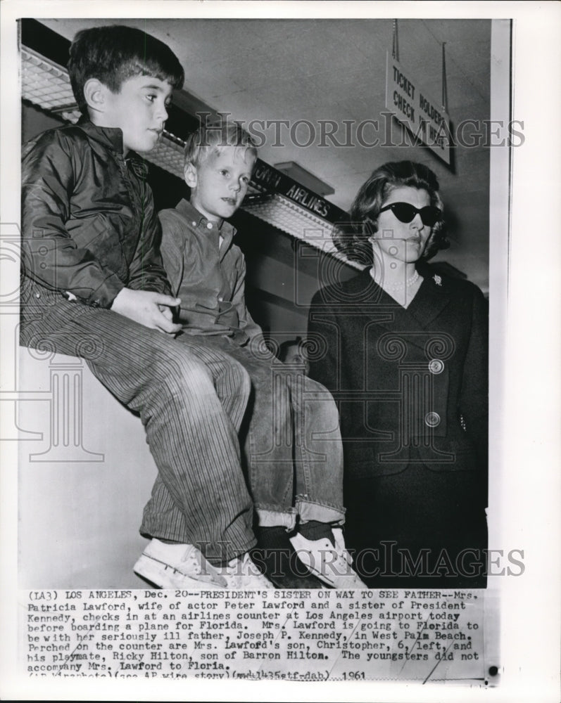 1961 Mrs. Patricia Lawford with her son at the Los Angeles Airport - Historic Images