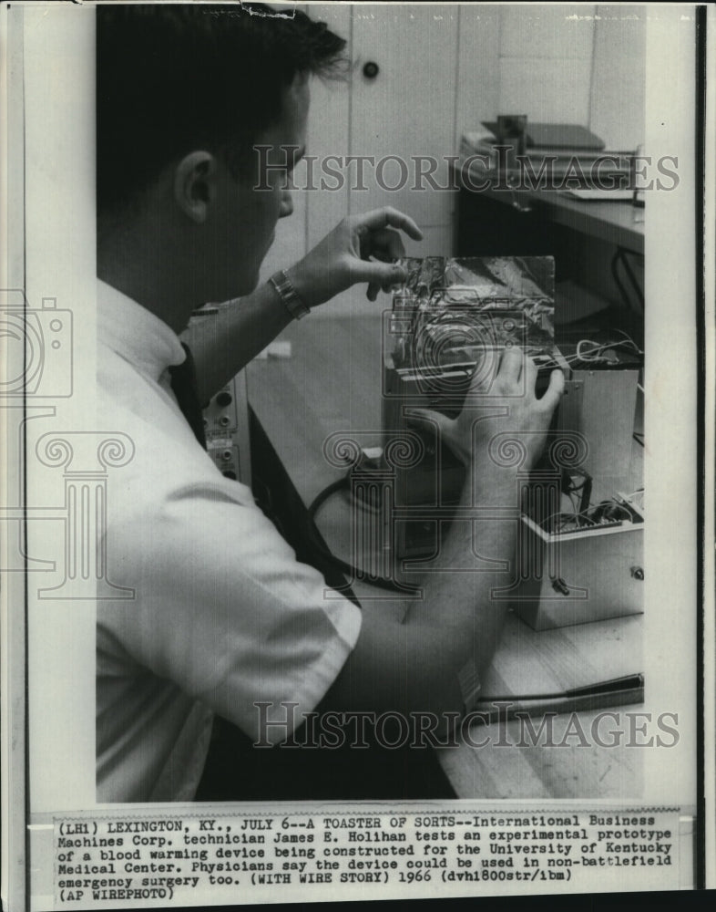 1966 Technician Holihan with the new medical equipment - Historic Images