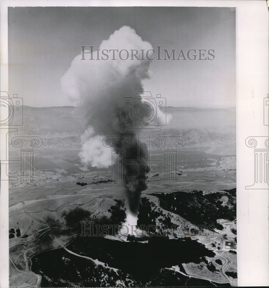 1963 Wire Photo The smoke from the solid propellant rocket during tests - Historic Images