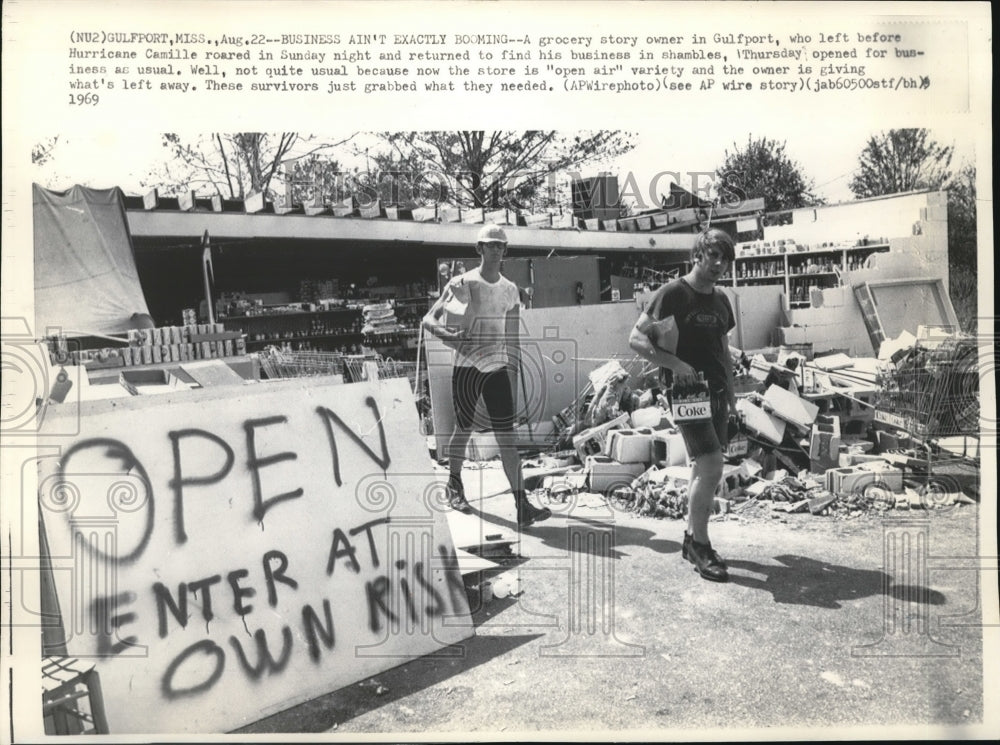 1969 Wire Photo Grocery story owner in Gulfport opened for business - cvw09410 - Historic Images