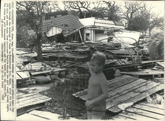 1969 Press Photo A Boy Walks through the Wreckage Homes in Mississippi City - Historic Images