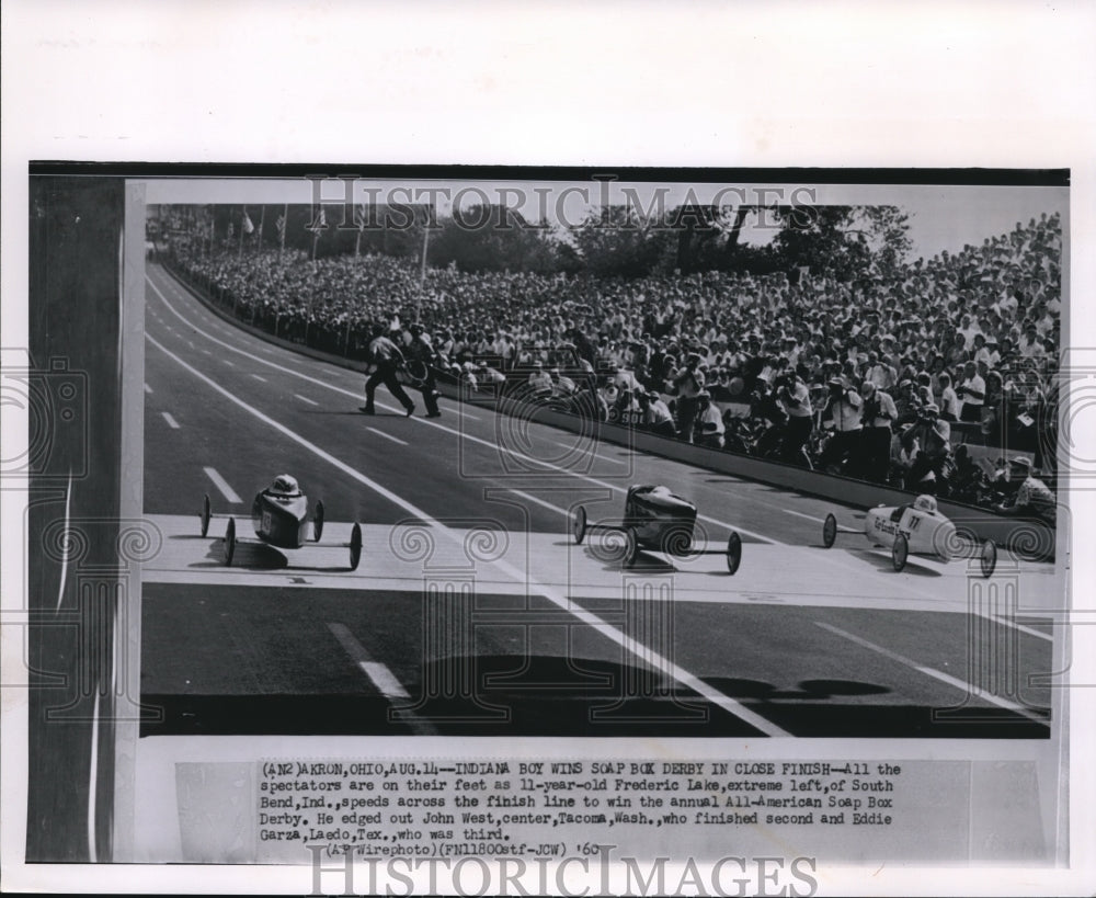 1960 Press Photo All the spectators are on their feet as 11 year old Frederic - Historic Images